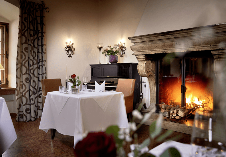 Dineren in klassieke stijl in het restaurant van Hotel Schloss Mittersill. © Mike Huber / Hotel Schloss Mittersill